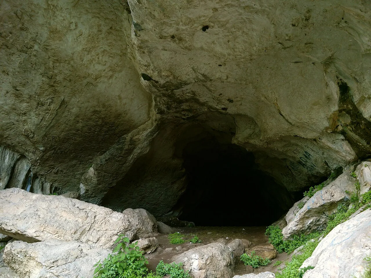 The entrance to Pëllumbas Cave near Tirana.