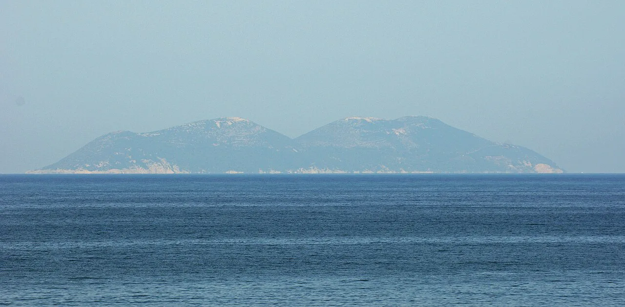 Sazan Island seen across the sea.