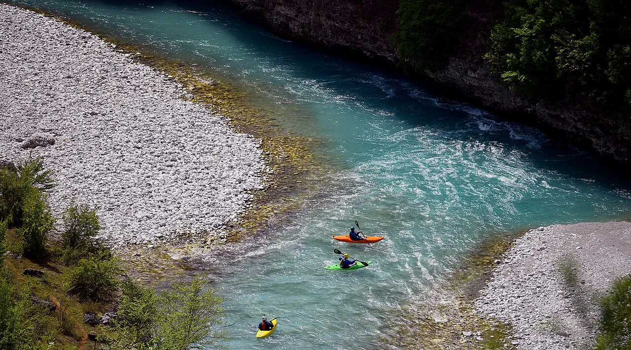 Kayakers on the turquoise Valbona River in northern Albania.