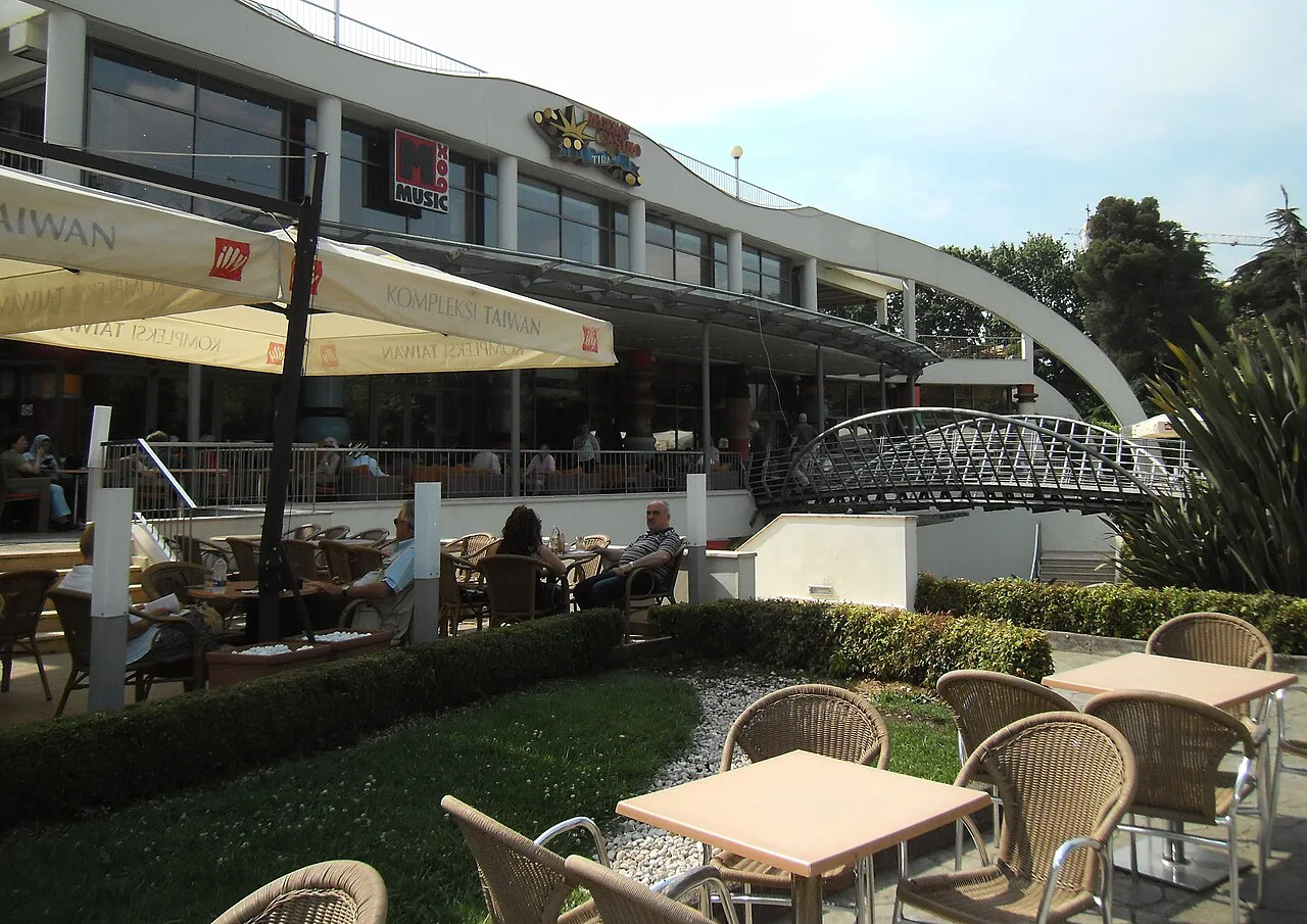 Café tables outside the Taiwan building in Tirana.