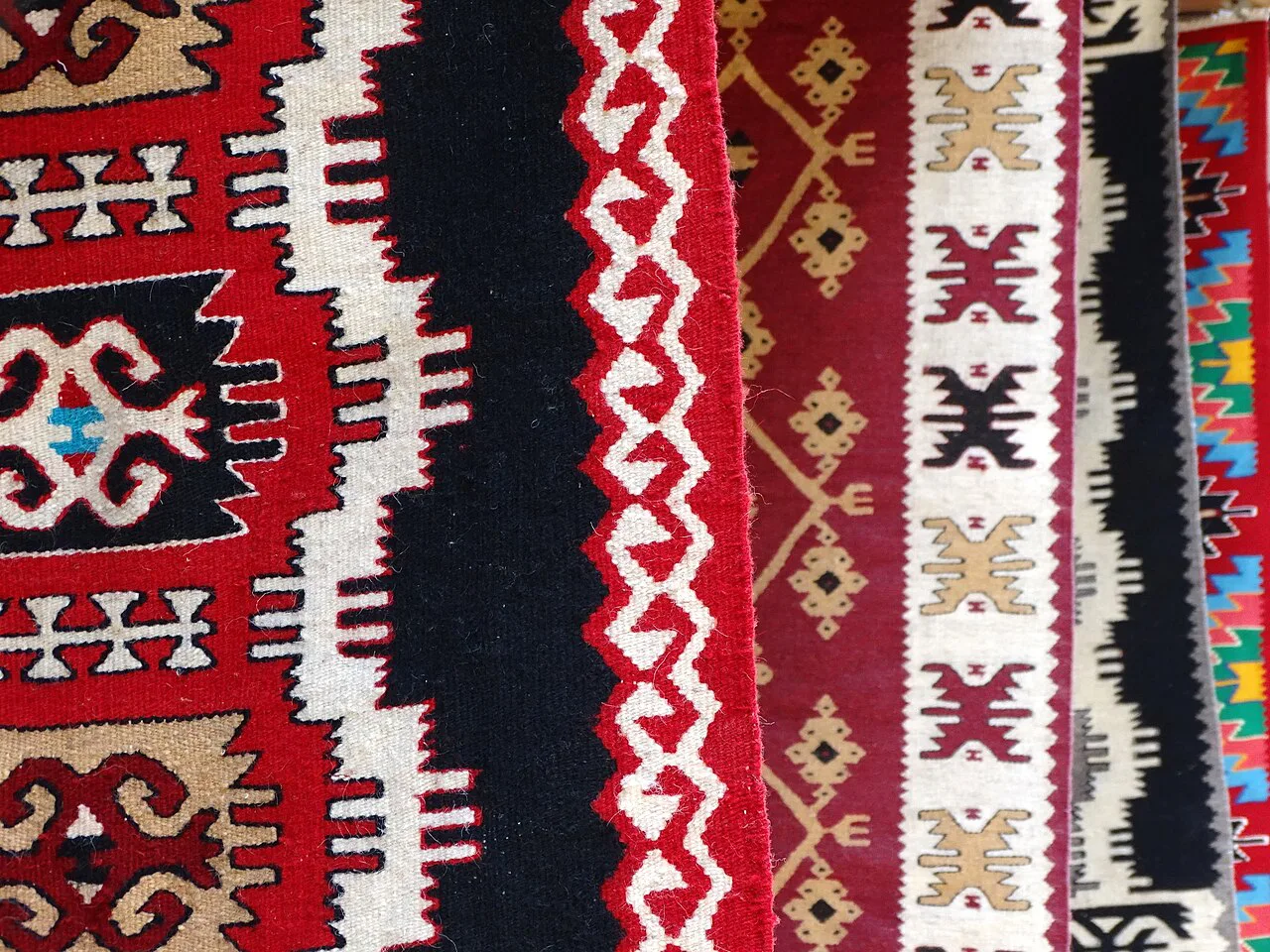 Patterned carpets for sale in the bazaar in Krujë.