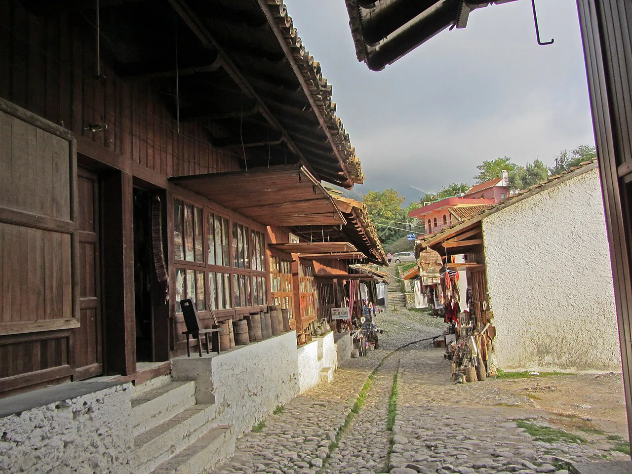 Wooden shopfronts along the old bazaar in Krujë.