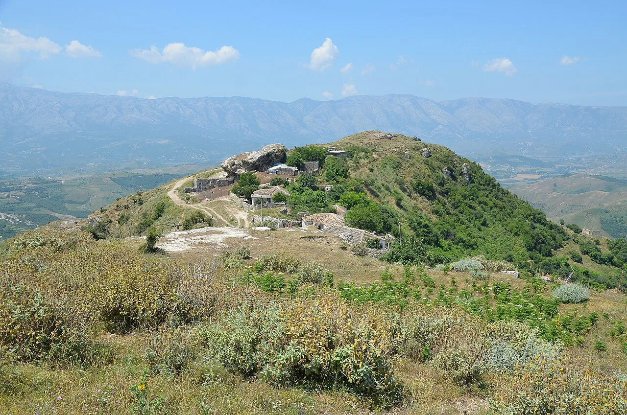 The acropolis hill of Amantia above the surrounding valleys.
