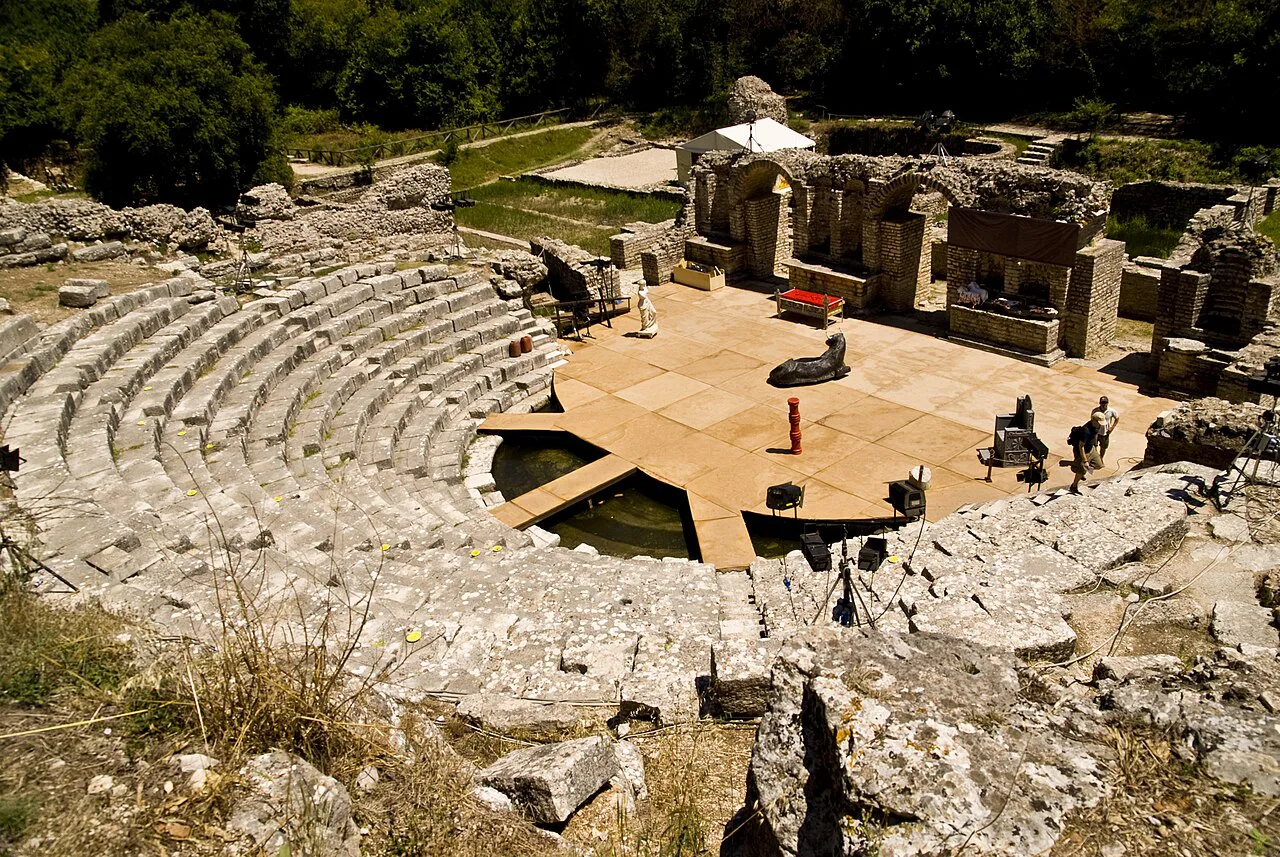 The ancient theatre at Butrint, seen from above its stone seating.