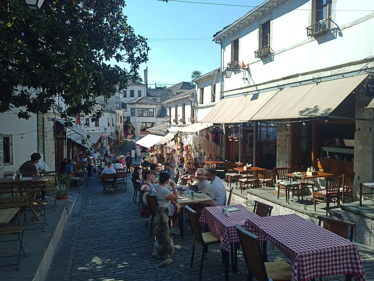 Café terraces on Rruga Gjin Bue Shpata in the old town of Gjirokastër.