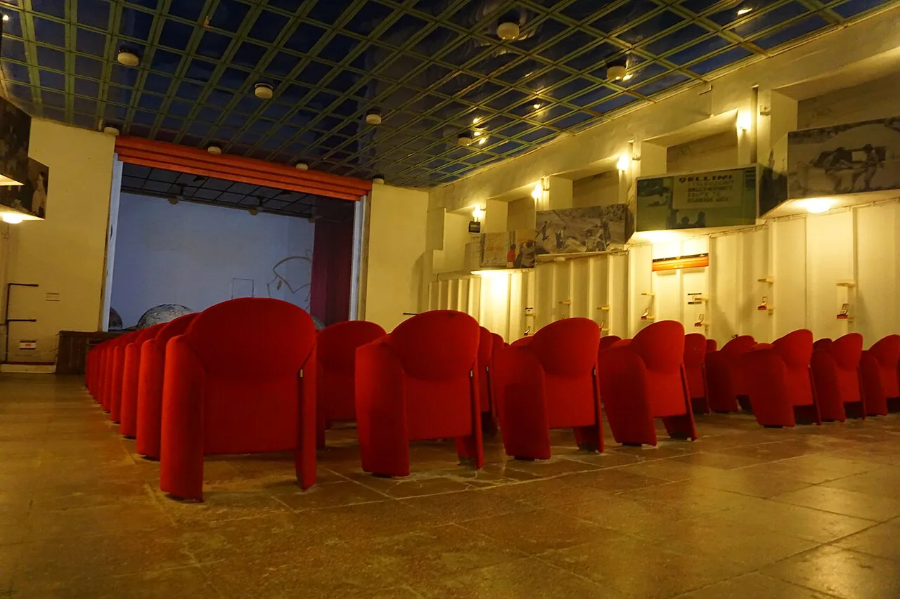 The assembly hall with red seats inside Bunk'Art 1 in Tirana.