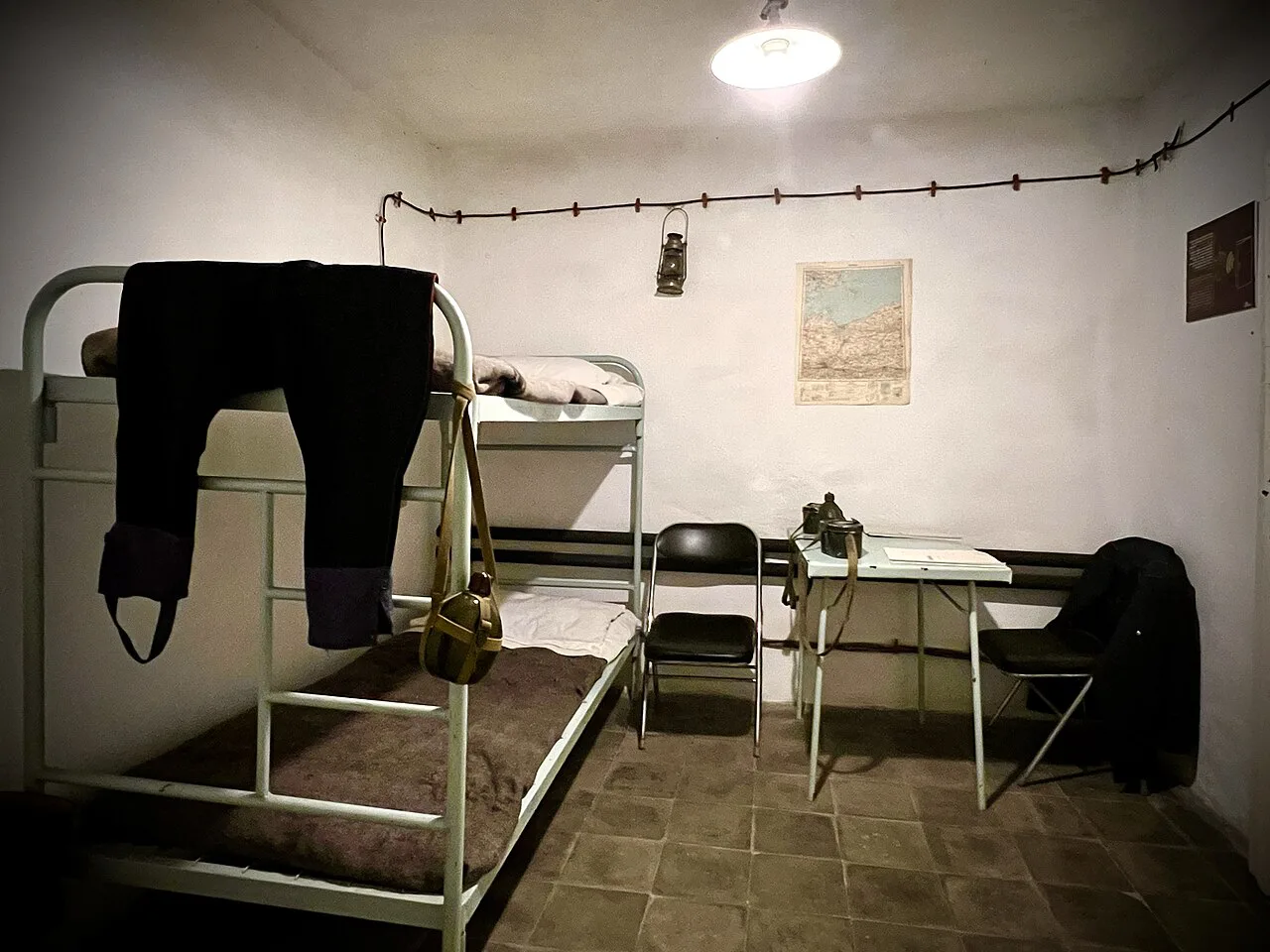 A bunker room with a bunk bed inside Bunk'Art 2.