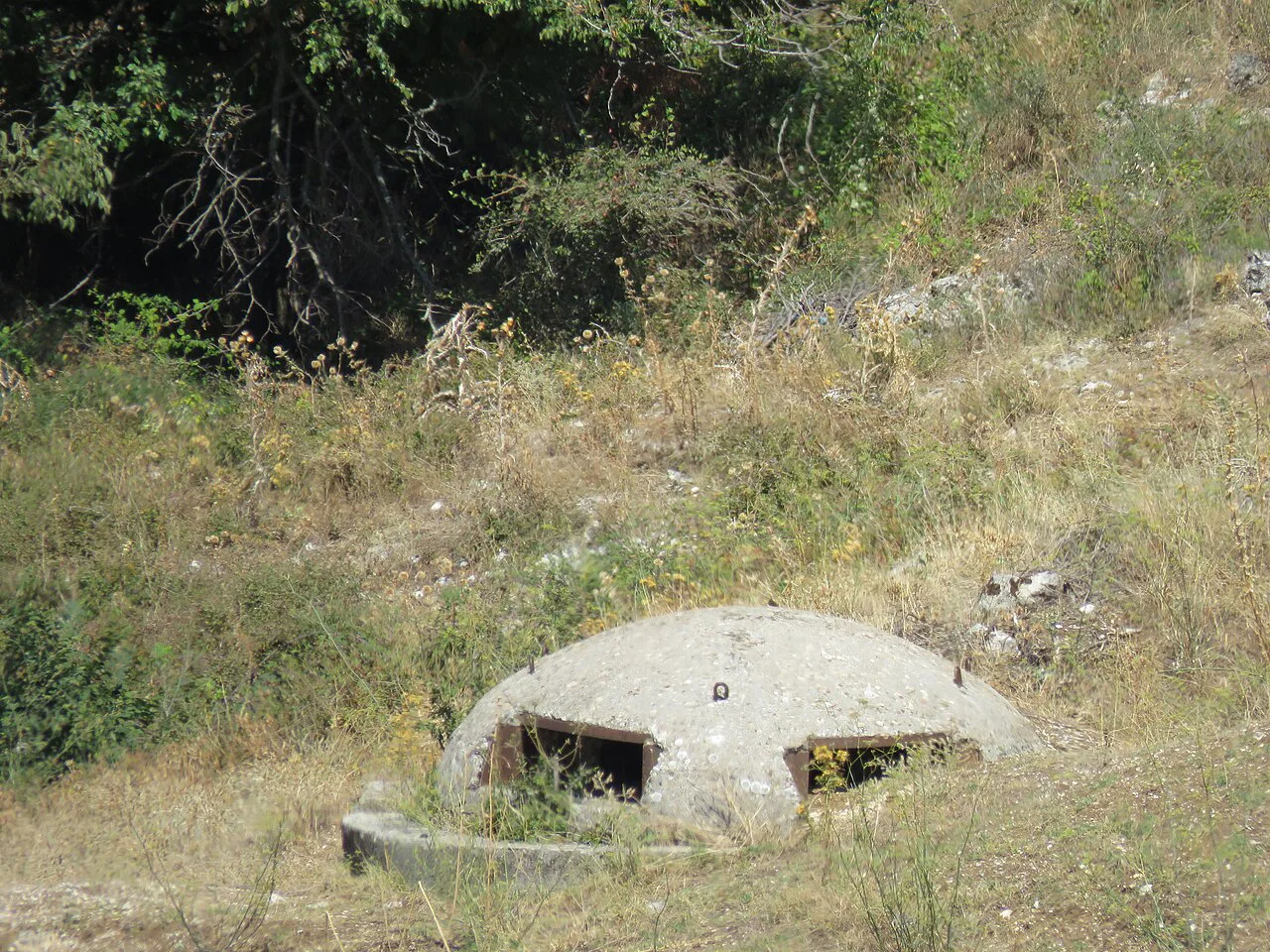 A small concrete bunker in the Drino valley south of Gjirokastër.
