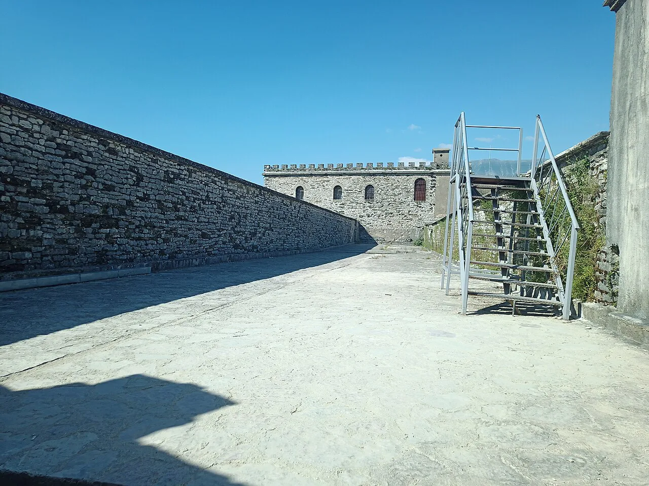 A walled courtyard inside Gjirokastër Castle.