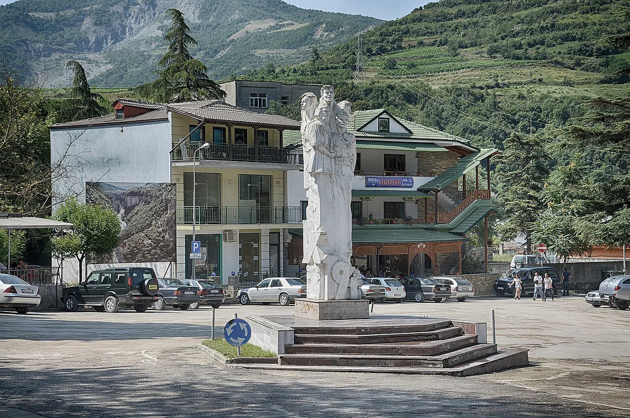 The main square of Çorovodë with its monument.