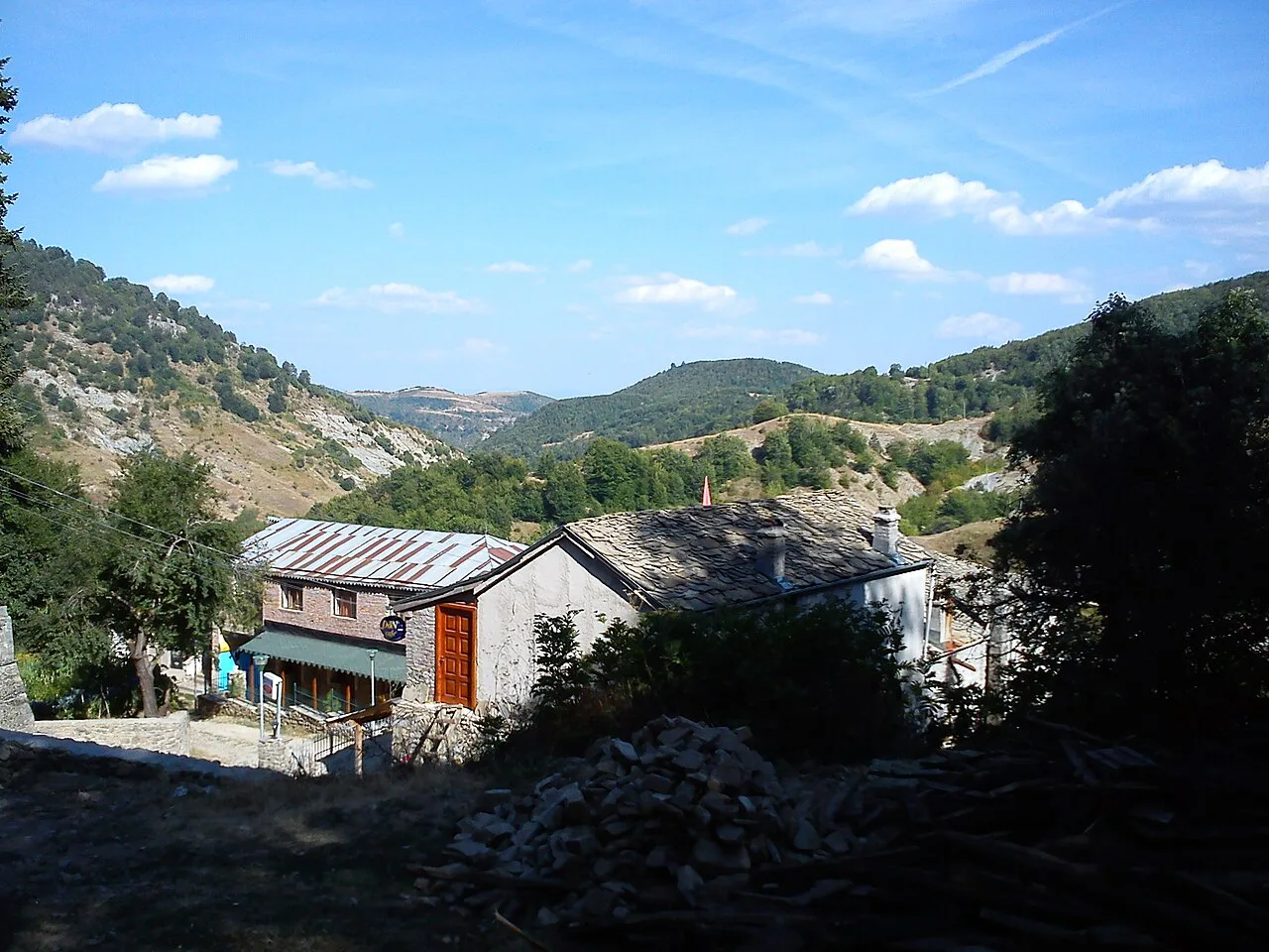 A stone house on the wooded hillside in Dardha.