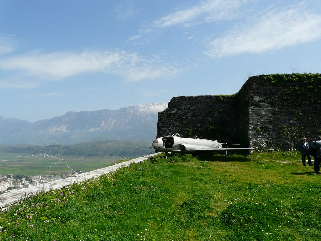 The walls of Gjirokastër Castle, with the valley beyond.