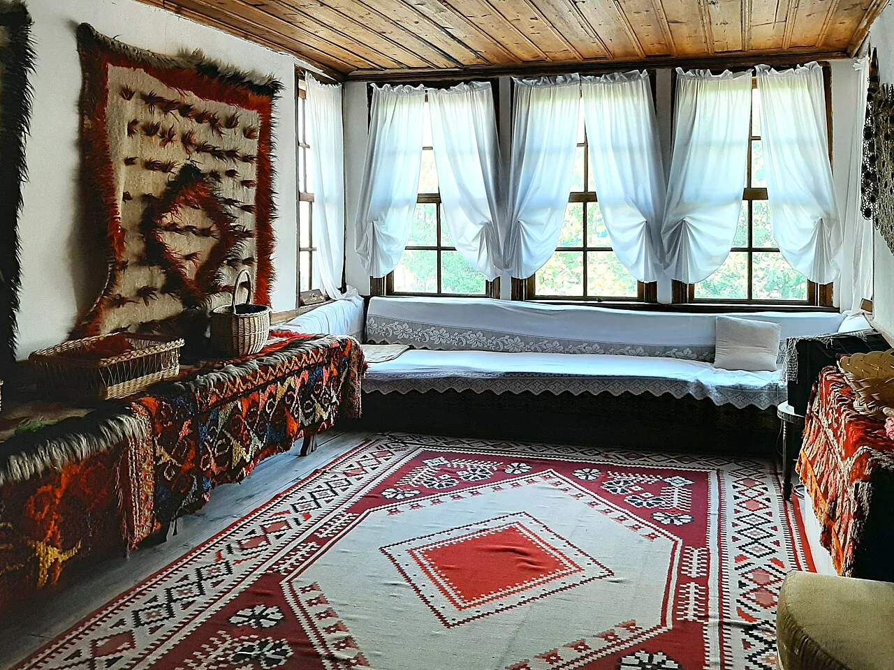 A traditional sitting room inside the Ethnographic Museum of Gjirokastër.