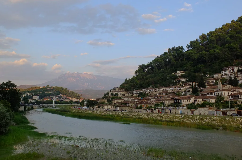 The Osum River flowing through Berat beneath its hillside houses.