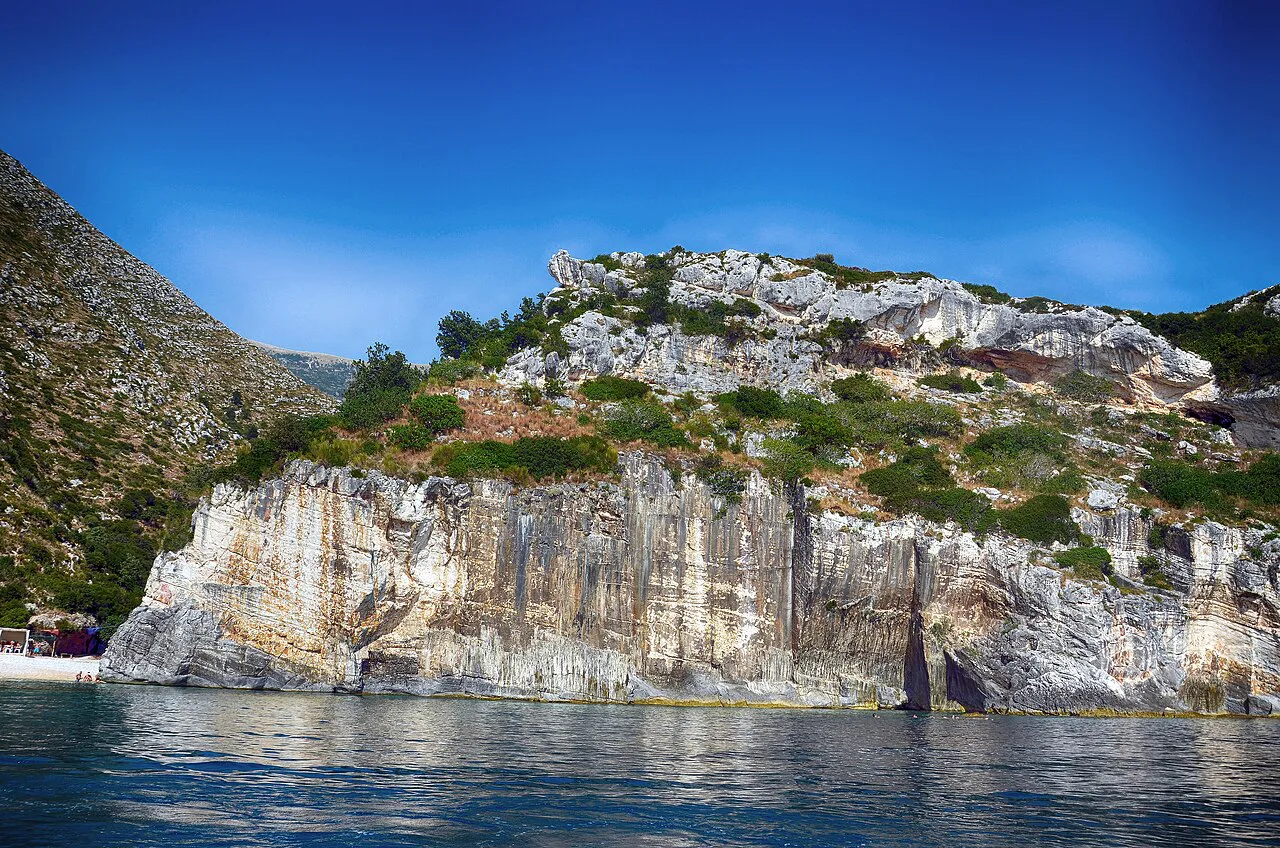Limestone cliffs above the water at Grama Bay.