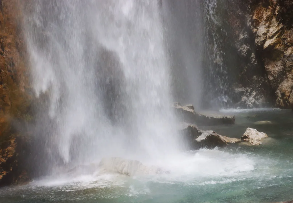 The Grunas waterfall tumbling into a pool near Theth.