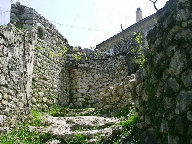 Ruined stone walls inside the old fortress of Himarë.
