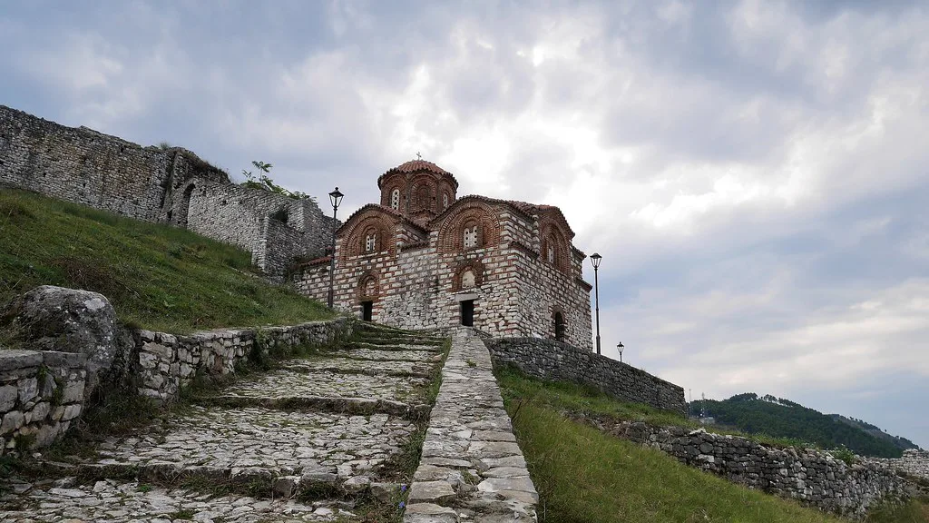 A stone path leading up to the Holy Trinity Church in Berat Castle.