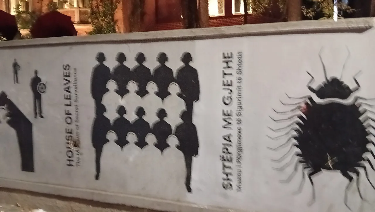 A mural on the outside wall of the House of Leaves museum in Tirana.