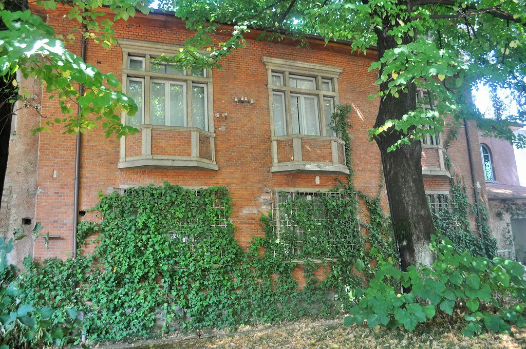 The ivy-covered facade of the House of Leaves, now the Museum of Secret Surveillance in Tirana.