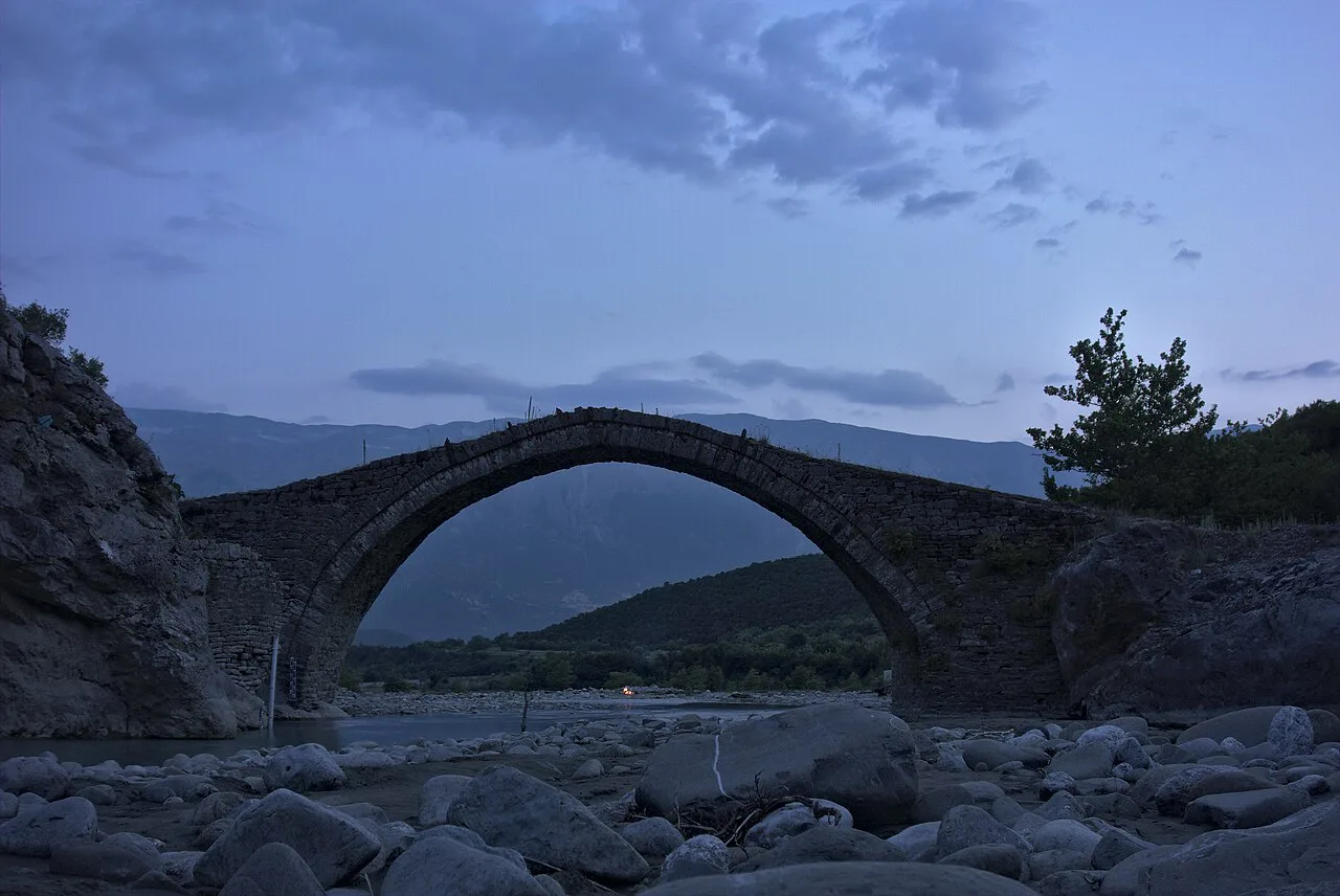 The arched Kadiut Bridge over the River Lengarica.