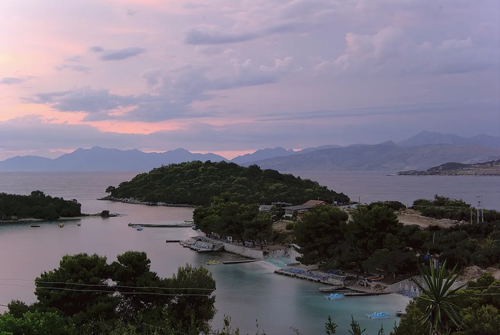 The islands and bay of Ksamil at dusk on the Albanian Riviera.