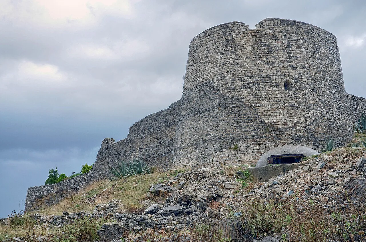 The stone tower of Lëkurësi Castle above Sarandë.