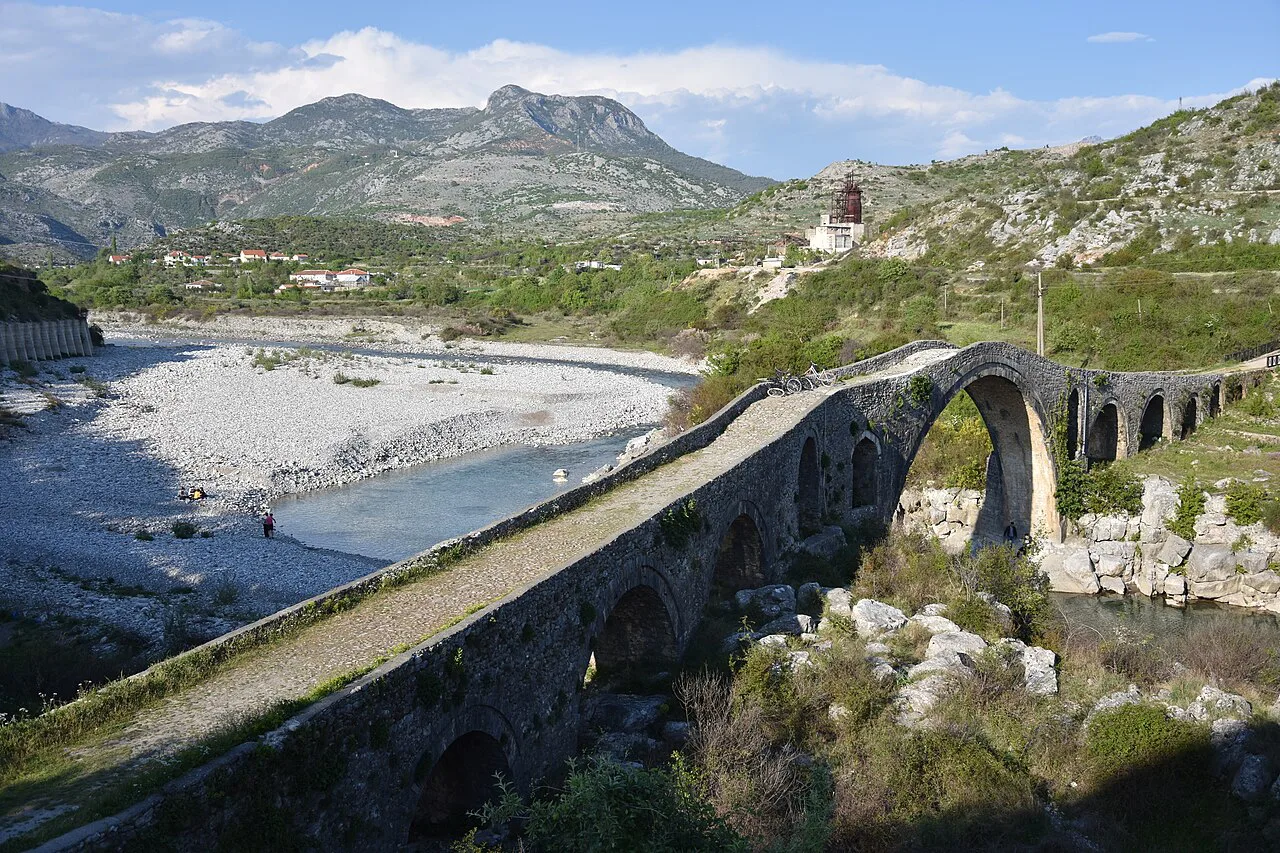 The Mes Bridge arching over the river near Shkodër.