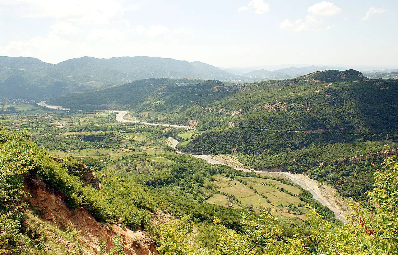 The Erzen river winding through hills near Iba, south of Tirana.