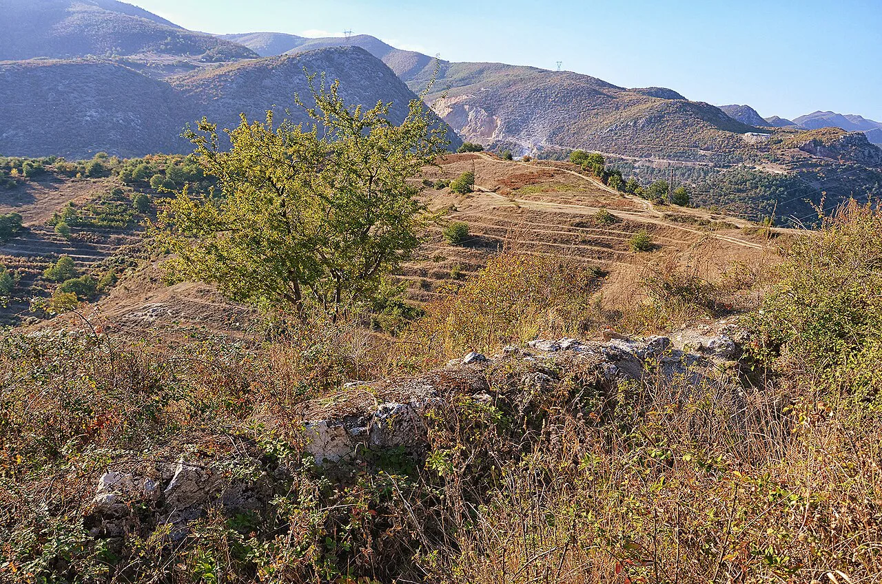 Remains of the walls of Pogradec Castle on the hillside.