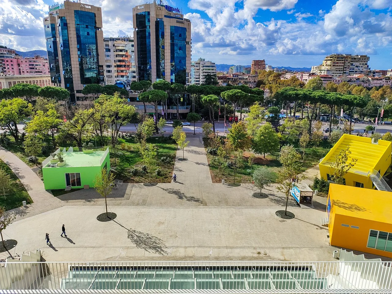 View from the top of the Pyramid of Tirana over its colourful boxes and the city towers.