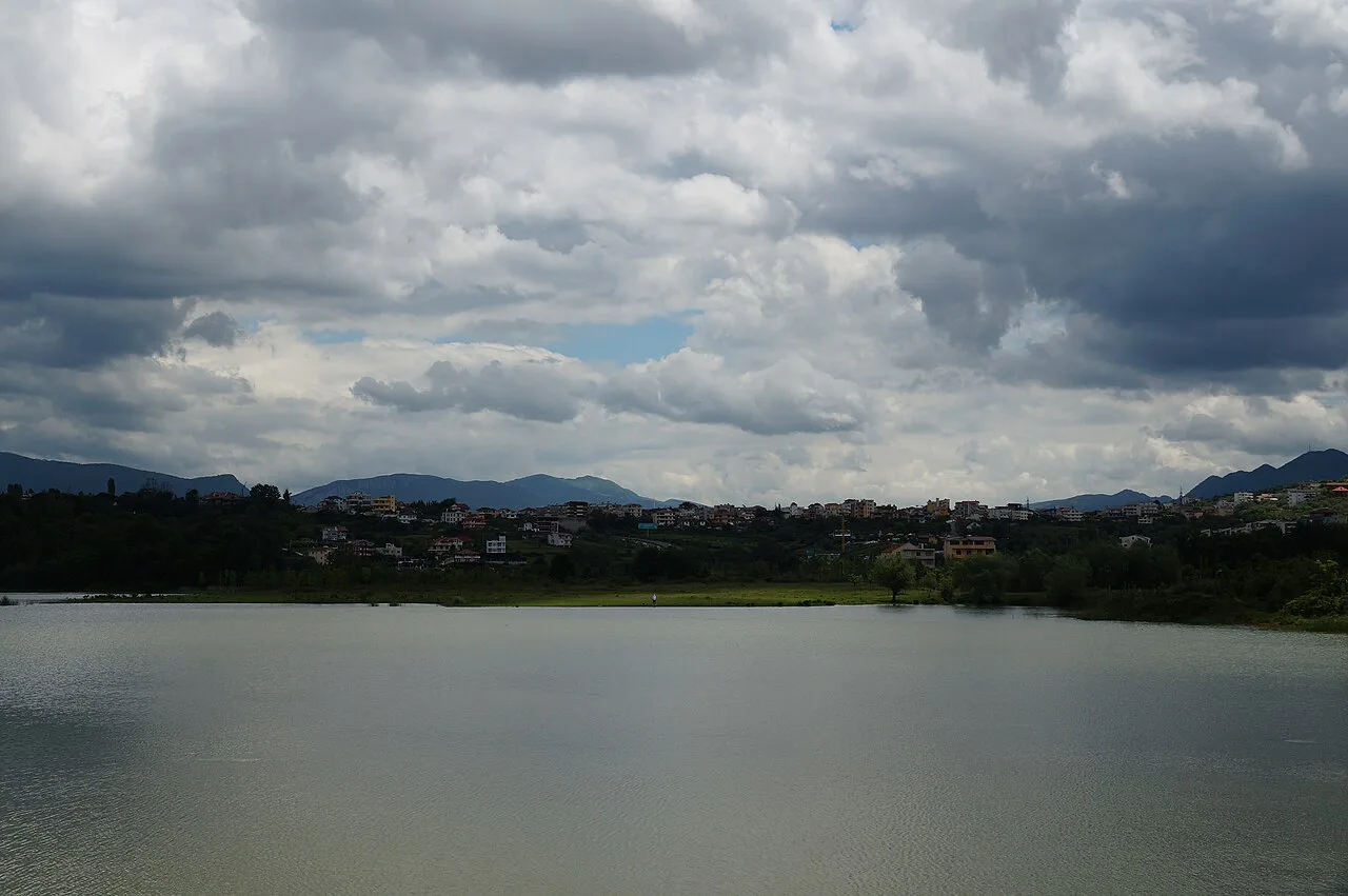 The Artificial Lake of Tirana with the suburb of Sauk beyond.