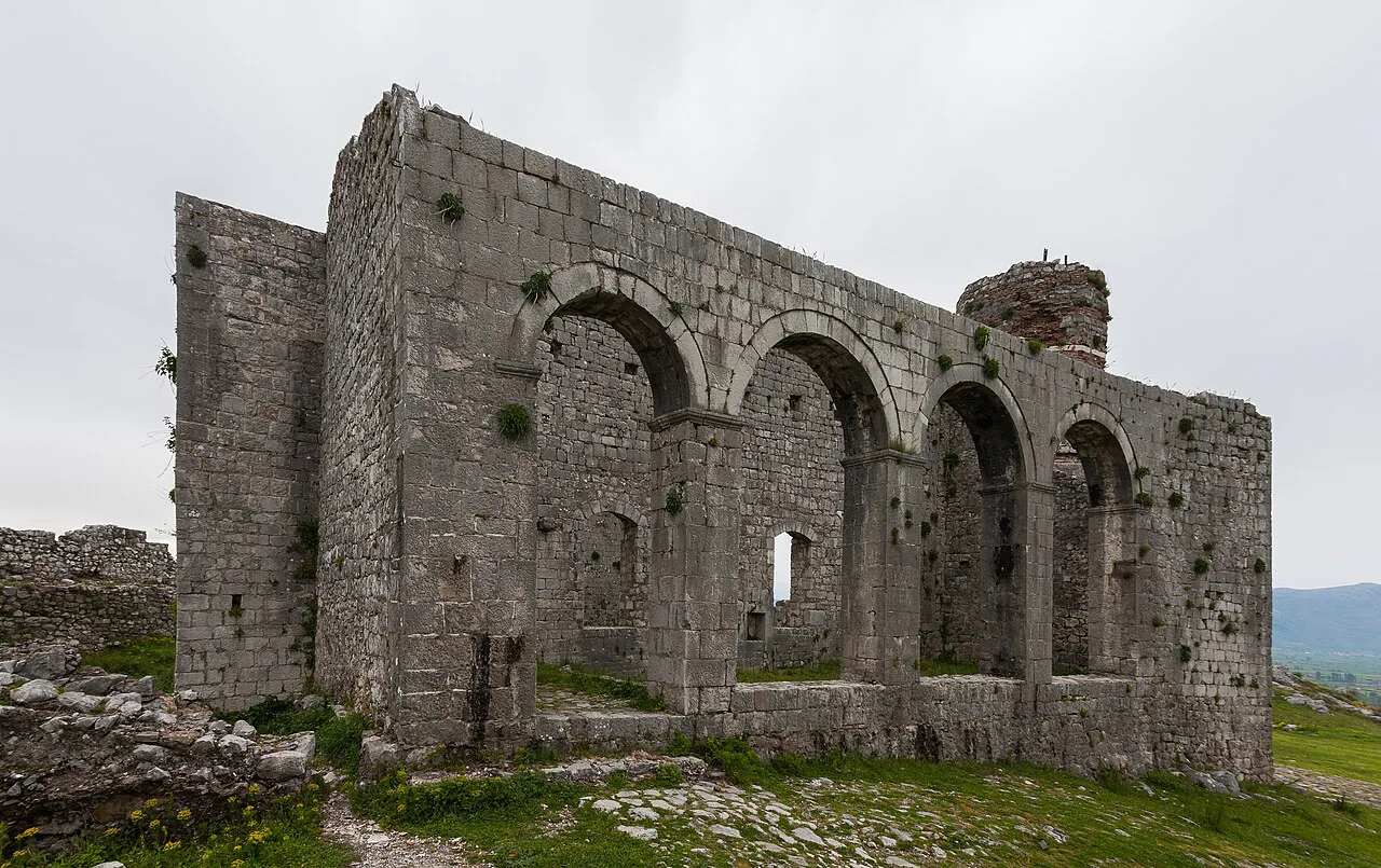 Ruined stone arches inside Rozafa Castle above Shkodër.