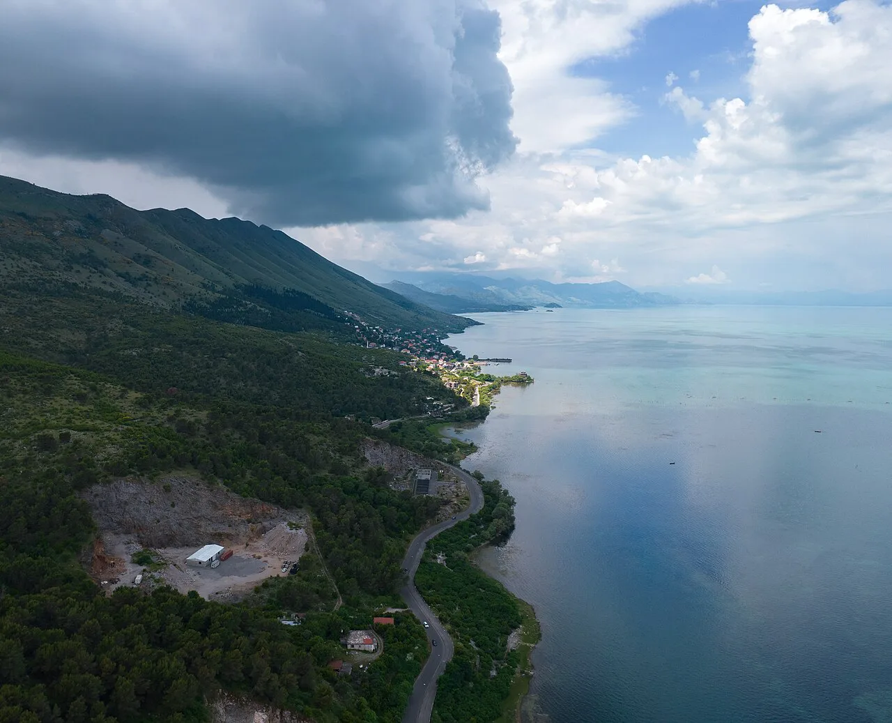 Lake Shkodër near Shiroka, with mountains in the distance.