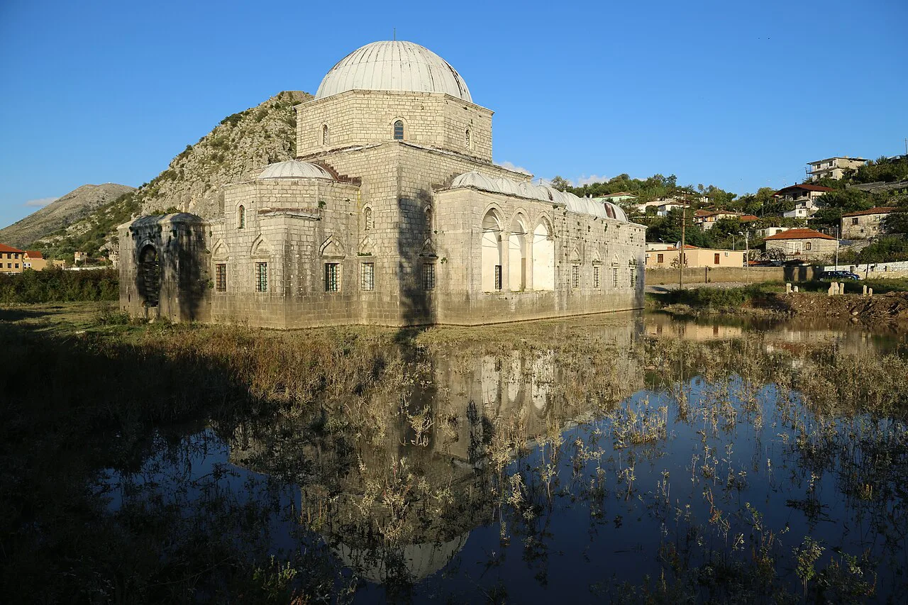The Lead Mosque in Shkodër reflected in water.