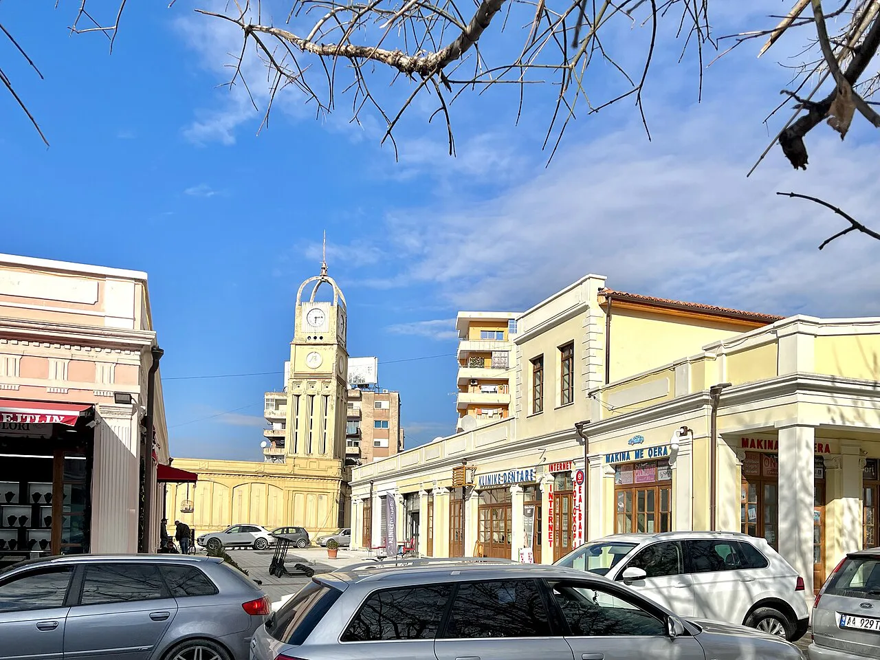 A street in the old town of Vlorë with a clock tower.