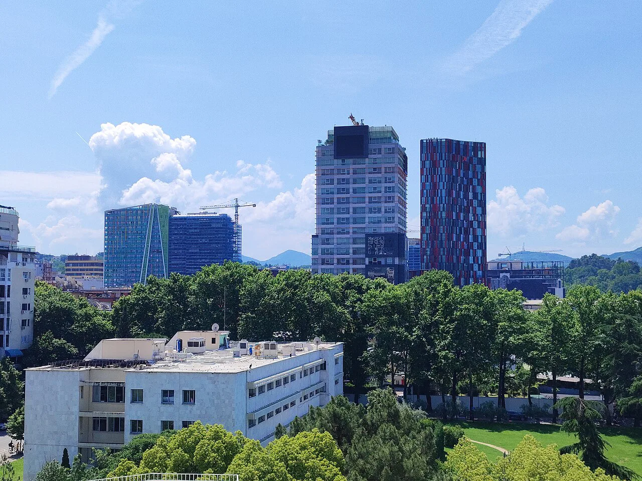 Modern towers on the Tirana skyline seen from the top of the Pyramid of Tirana.