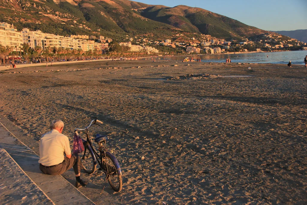 The beach and coastline at Vlorë in the evening light.